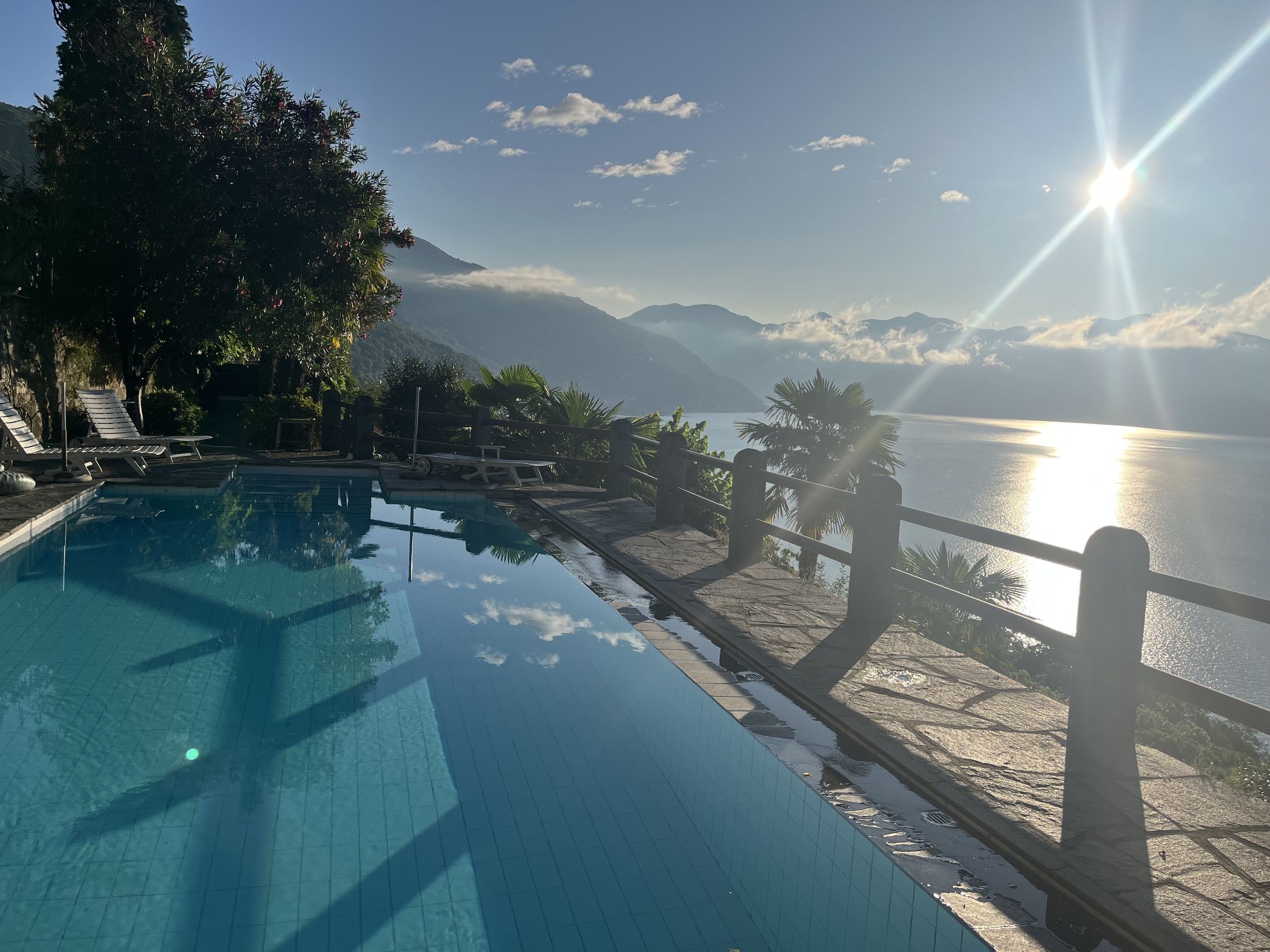 The pool at Villa Roccolo with Lake Maggiore and the mountains beyond
